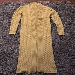 Nice thick yellow cardigan with two pockets on the front
